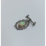 An attractive Victorian opal and diamond brooch wi