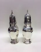 A good pair of large silver casters contained with