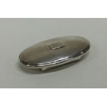 A fancy oval hinged top silver snuff box with gilt
