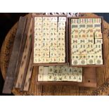 A cased wooden and bone Mahjong set. Est. £50 - £8