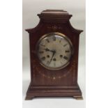 An attractive inlaid mahogany bracket clock with s