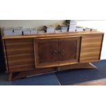 A massive Art Deco sideboard with marble inset top