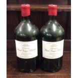 Two EMPTY 3 litre Pauillac wine bottles. (2)