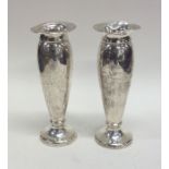 A pair of silver spill vases of plain design. Appr