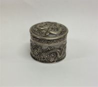 A Chinese silver and silver gilt box decorated wit