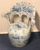 An unusual Chinese seat decorated with dragons. Es