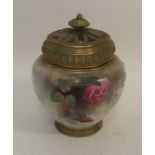 A Royal Worcester pot pourri decorated with flower