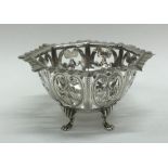 An Edwardian pierced silver bonbon dish with crimp