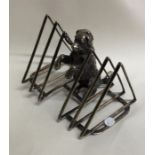 A novelty silver plated toast rack mount in the fo