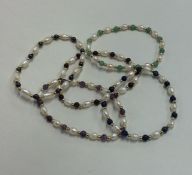 A group of five pearl mounted bracelets. Approx. 2