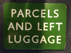 An old Railway enamelled sign entitled, 'Parcels a