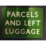 An old Railway enamelled sign entitled, 'Parcels a