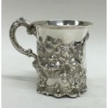 A good quality cast silver Victorian cup embossed