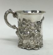 A good quality cast silver Victorian cup embossed