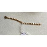 A 22 carat gold fancy link bracelet. Approx. 9.3 g