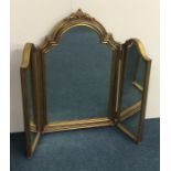 A gilt framed triple mirror with scroll top. Appro