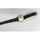 TISSOT: A gent's stainless steel wristwatch on lea