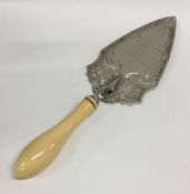 A good Victorian silver trowel with turned ivory h