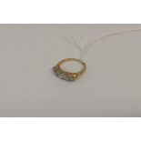 A good diamond five stone ring in 18 carat gold ca