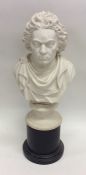 A bust depicting Beethoven on pedestal base. Appro