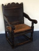 A small early Antique Wainscot oak chair with stre