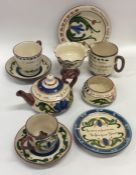 A quantity of Devonware to include a teapot, cups,