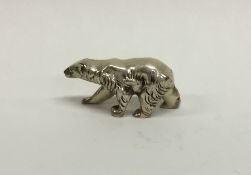 A novelty silver model of a polar bear with textur