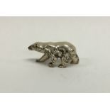 A novelty silver model of a polar bear with textur