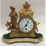 A French mantle clock with white enamel dial conta