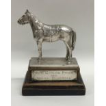 A good quality cast silver presentation trophy of