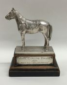 A good quality cast silver presentation trophy of