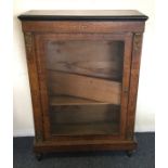 A Victorian inlaid Pier cabinet on bun feet. Est.