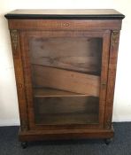 A Victorian inlaid Pier cabinet on bun feet. Est.