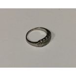 A platinum and diamond two row ring in claw mount.
