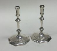 A good pair of George I style taper candlesticks.