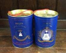 Two x cylindrical boxed Bell's Old Scotch Whiskys