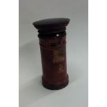 An unusual Antique leather inkwell in the form of