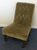 A small Edwardian button back nursing chair. Est.