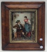 A rectangular maple framed miniature of a couple w