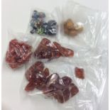 A bag containing amber beads, crystal necklace etc