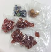 A bag containing amber beads, crystal necklace etc