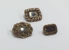 A group of three Antique mourning brooches. Approx