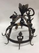 An unusual cast iron Medieval style wall hanging o