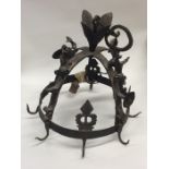 An unusual cast iron Medieval style wall hanging o