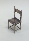 A small silver Georgian style miniature chair with