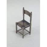 A small silver Georgian style miniature chair with