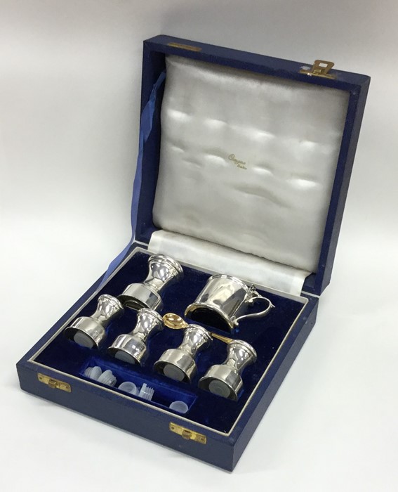 A good quality cased silver cruet set. London. By