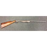An Antique air rifle with mahogany stock. Est. £60