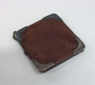 A leather and silver mounted wallet. Est. £30 - £4