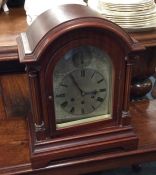 A Westminster chime mahogany mantle clock with flu